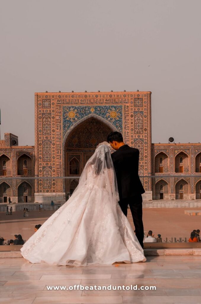 A married couple at Registan Square in Samarkand